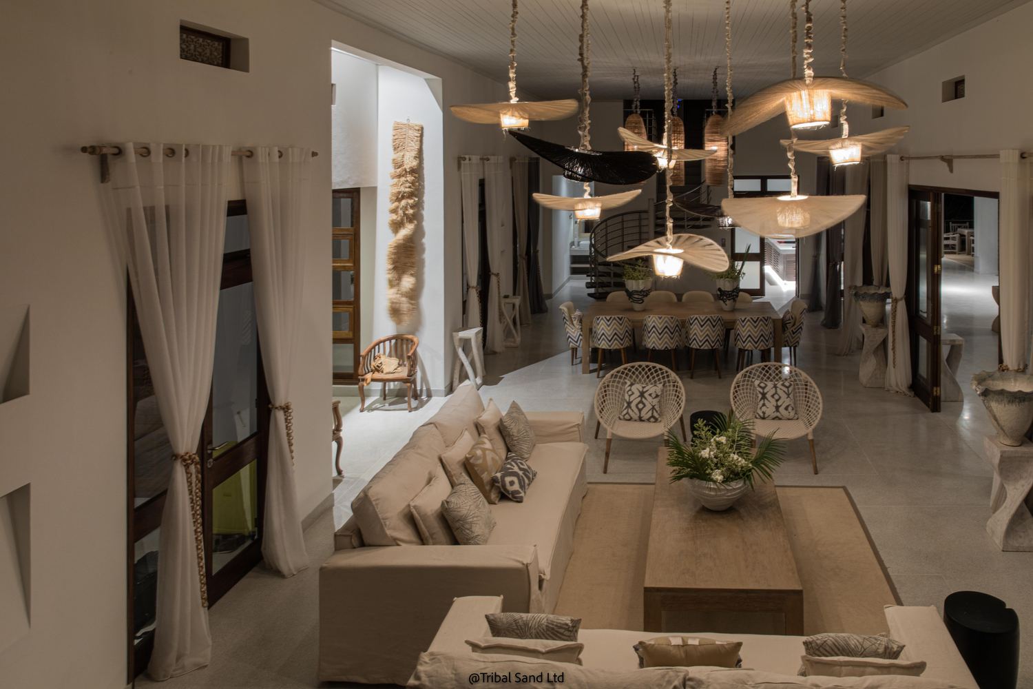 The open-plan living and dining room at My Amani in the evening